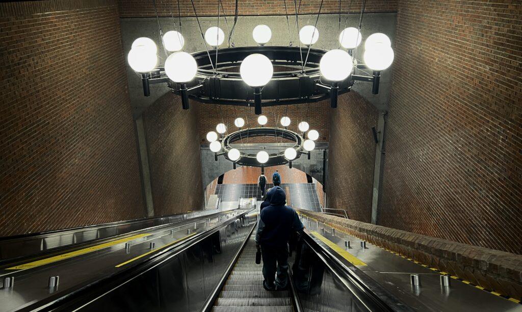 Iconic chandelier above elevators at Snowdon metro station in Montreal during November 2025 STM transit strike